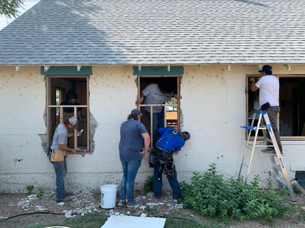 Lamar Community College students work on a house in need of renovation in their community as part of the COPERR program. 