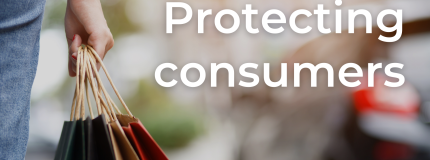 A photo of a person's hand holding a shopping back and walking along a street, with the words "protecting consumers" overlaid.