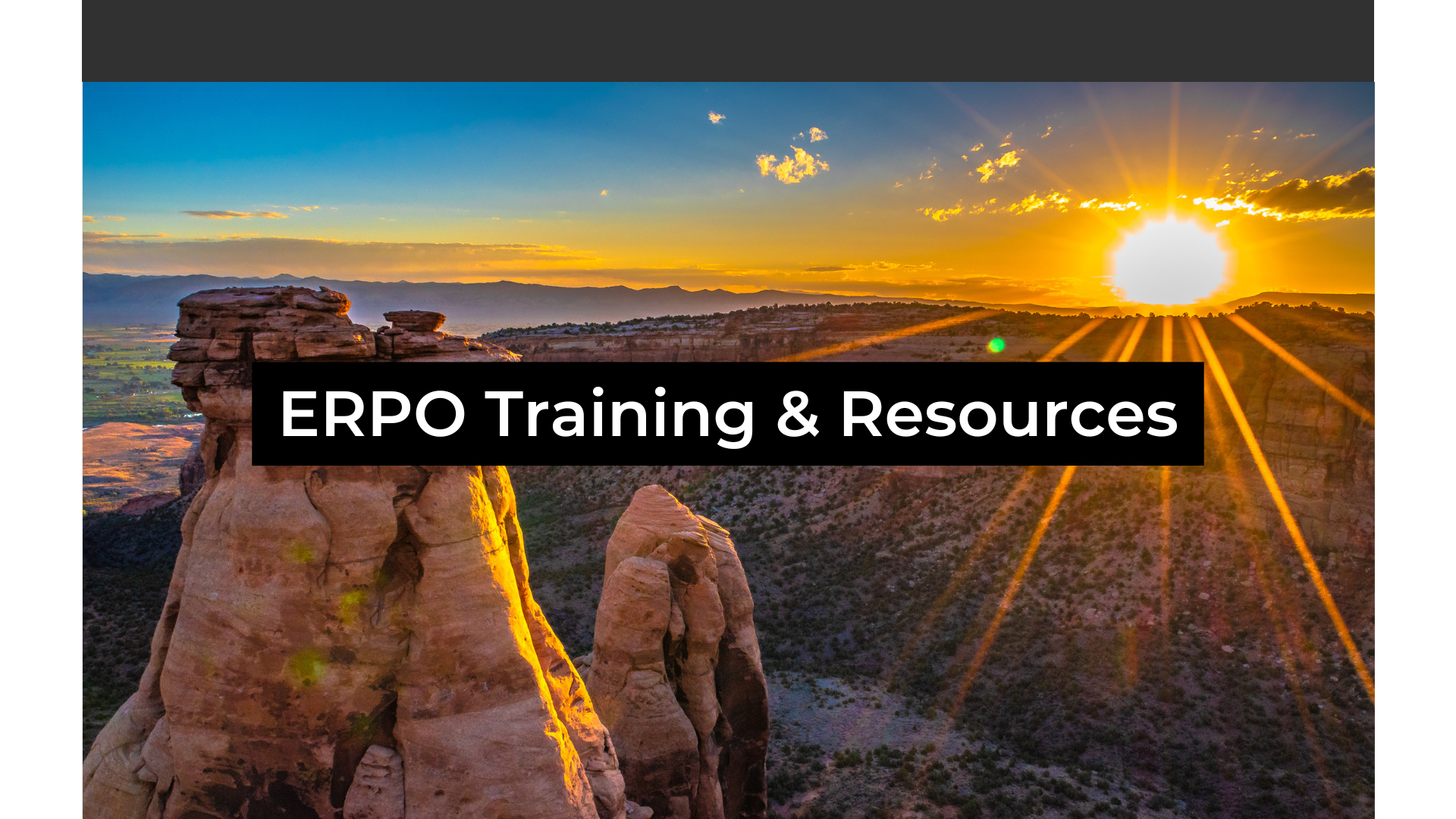Colorado National Monument in the background at sunrise with the words ERPO Training & Resources